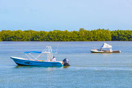 Holbox Mexico December 21, 2021 Panorama landscape view on beautiful Holbox island with boats natural forest and turquoise water in Quintana Roo Mexico.のeditorial素材