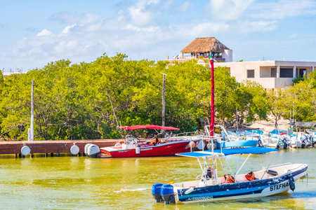 Holbox Mexico December 21, 2021 Panorama landscape view on beautiful Holbox island with boats Holbox Express ferry village port harbor Muelle de Holbox and turquoise water in Quintana Roo Mexico.のeditorial素材