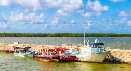 ChiquilÃ¡ Mexico December 21, 2021 Panorama landscape view on beautiful ChiquilÃ¡ with boats ferry village port harbor Puerto de ChiquilÃ¡ and turquoise water in Quintana Roo Mexico.のeditorial素材
