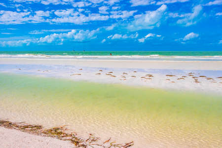 Panorama landscape view on beautiful Holbox island sandbank and beach with waves turquoise water and blue sky in Quintana Roo Mexico.の写真素材