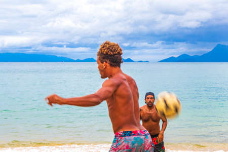 Ilha Grande Brazil November 23, 2020 Male soccer players at the big tropical island Ilha Grande Praia de Palmas beach in Angra dos Reis Rio de Janeiro Brazil.のeditorial素材