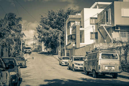 Playa del Carmen Mexico February 02, 2022 Black and white picture of a typical street road and cityscape with cars and buildings of Luis Donaldo Colosio Playa del Carmen in Mexico.のeditorial素材