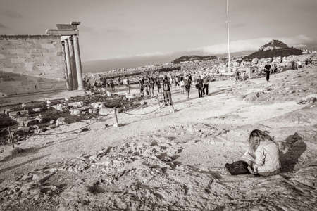 Athens Greece October 04, 2018 Black and white picture of Eretteo temple at the Acropolis of Athens with amazing and beautiful ruins Parthenon and blue sky in Greece's capital Athens in Greece.のeditorial素材