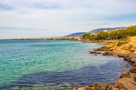 Natural green turquoise beach and water in Vouliagmeni Beach near to Voula in Greece.の写真素材