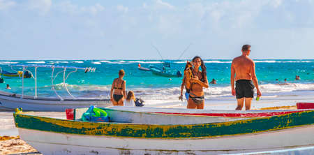 Tulum Mexico February 02, 2022 Amazing and beautiful caribbean coast and beach panorama view with turquoise water people and boats of Tulum in Quintana Roo Mexico.のeditorial素材
