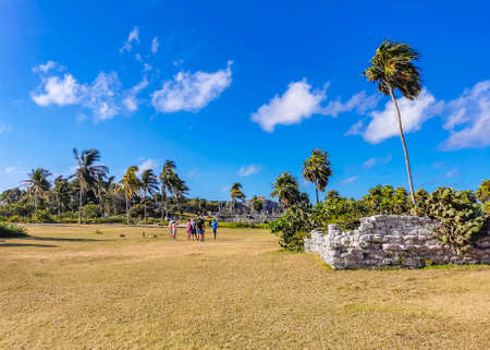 Tulum Mexico February 24, 2022 Ancient Tulum ruins Mayan site with temple ruins pyramids and artifacts in the tropical natural jungle forest palm and seascape panorama view in Tulum Mexico.のeditorial素材