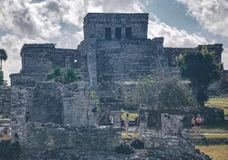 Tulum Mexico February 24, 2022 Ancient Tulum ruins Mayan site with temple ruins pyramids and artifacts in the tropical natural jungle forest palm and seascape panorama view in Tulum Mexico.のeditorial素材