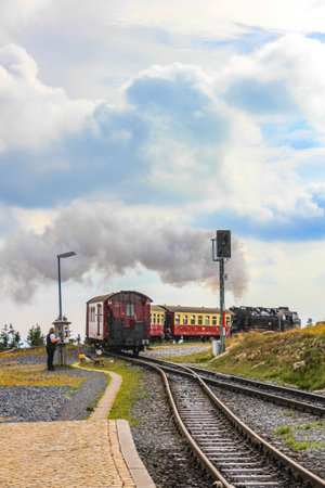 Lower Saxony Germany September 12, 2010 Brockenbahn Locomotive and railway train at the forest and landscape panorama at Brocken mountain peak in Harz mountains Wernigerode Saxony-Anhalt Germanyのeditorial素材