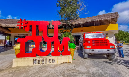 Tulum Mexico March 09, 2022 Big red sign lettering writing Tulum Magico in Tulum Quintana Roo Mexico.のeditorial素材