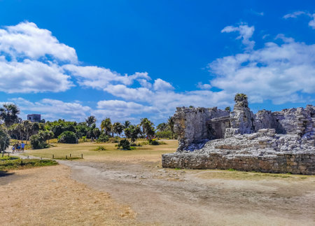 Tulum Mexico April 11, 2022 Ancient Tulum ruins Mayan site with temple ruins pyramids and artifacts in the tropical natural jungle forest palm and seascape panorama view in Tulum Mexico.のeditorial素材