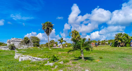 Tulum Mexico June 26, 2022 Ancient Tulum ruins Mayan site with temple ruins pyramids and artifacts in the tropical natural jungle forest palm and seascape panorama view in Tulum Mexico.のeditorial素材