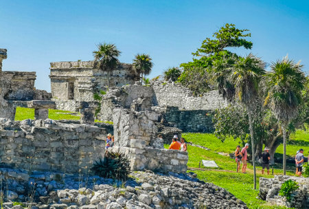 Tulum Mexico June 24, 2022 Ancient Tulum ruins Mayan site with temple ruins pyramids and artifacts in the tropical natural jungle forest palm and seascape panorama view in Tulum Mexico.のeditorial素材