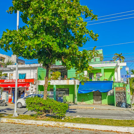 Playa del Carmen Mexico July 04, 2022 Typical street road and cityscape with cars and buildings of Luis Donaldo Colosio Playa del Carmen in Mexico.のeditorial素材