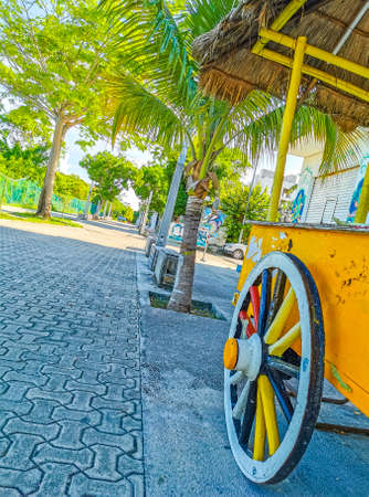 Drivable orange tropical juice shop on wheels in Playa del Carmen Mexicoの写真素材