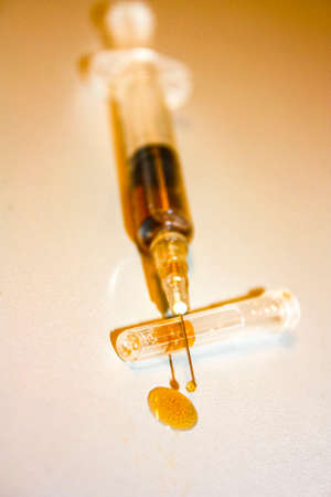 Drugs pills shots cigarettes and alcohol how dependence and addiction hold us captive.の写真素材