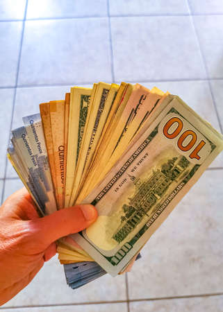 Playa del Carmen Mexico 10 May 2022 US dollar banknotes in hand from the United States in Playa del...