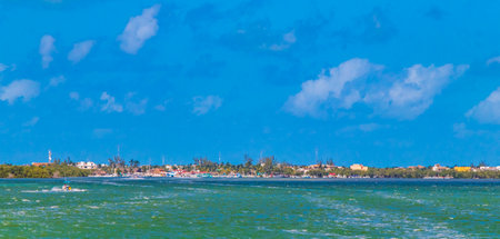 Panorama landscape view on beautiful Holbox island with Holbox Express ferry village port harbor and...