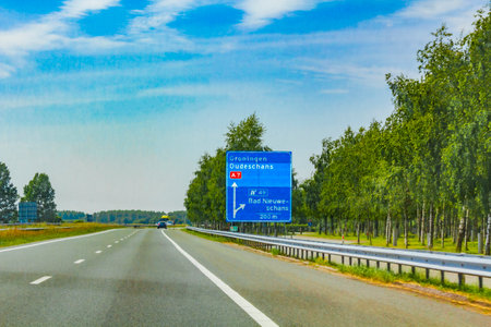 Groningen Netherlands 18 June 2013 Brown road sign at the highway freeway motorway autobahn to Groningen Dutch Holland Netherlands.の写真素材