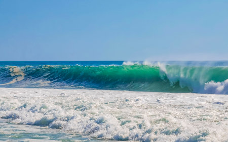 Extremely huge big surfer waves on the beach in Zicatela Puerto Escondido Oaxaca Mexico.の写真素材