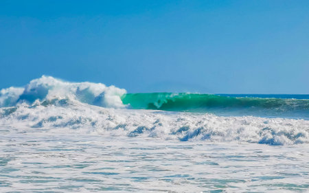 Extremely huge big surfer waves on the beach in Zicatela Puerto Escondido Oaxaca Mexico.