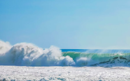 Extremely huge big surfer waves on the beach in Zicatela Puerto Escondido Oaxaca Mexico.