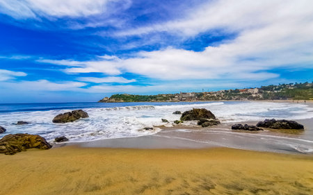 Extremely beautiful huge big surfer waves on the beach in Zicatela Puerto Escondido Oaxaca Mexico.の写真素材