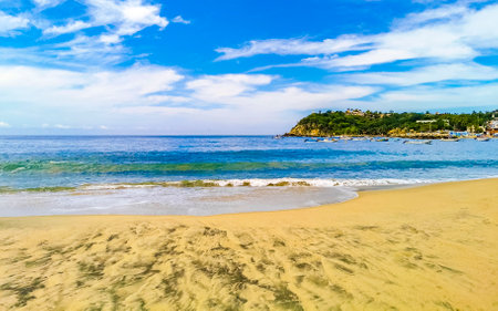 Beach and seascape shore with beautiful huge big surfer waves in Zicatela Puerto Escondido Oaxaca Mexico.の写真素材