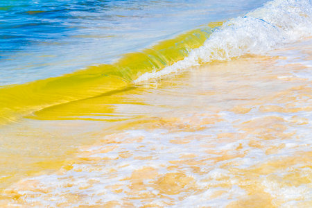 Waves at tropical mexican beach landscape panorama and caribbean sea with clear turquoise blue water in Playa del Carmen Mexico.の写真素材