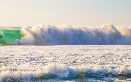 Extremely beautiful huge big surfer waves on the beach in Zicatela Puerto Escondido Oaxaca Mexico.の写真素材