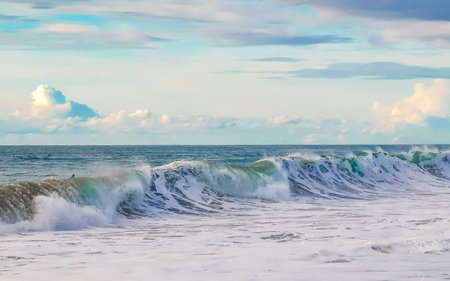 Extremely huge big surfer waves on the beach in Zicatela Puerto Escondido Oaxaca Mexico.の写真素材