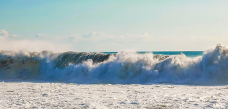 Extremely huge big surfer waves on the beach in Zicatela Puerto Escondido Oaxaca Mexico.の写真素材