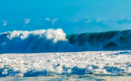 Extremely huge big surfer waves on the beach in Zicatela Puerto Escondido Oaxaca Mexico.の写真素材