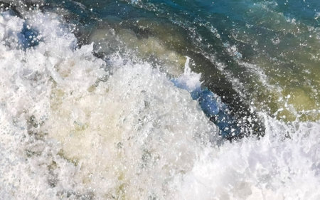 Extremely beautiful huge big surfer waves and rocks on the beach in Zicatela Puerto Escondido Oaxaca...