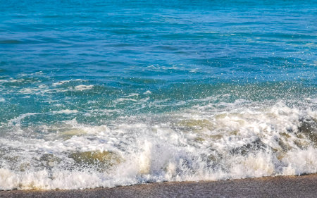 Extremely huge big surfer waves on the beach in Zicatela Puerto Escondido Oaxaca Mexico.の写真素材