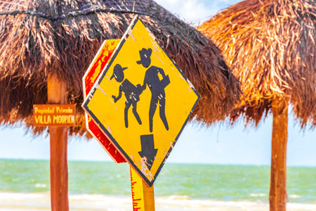 Traffic signs and road signs directional on Isla Holbox island in Quintana Roo Mexico.の写真素材