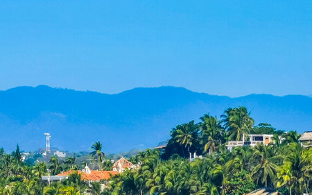 Mountains and hills on the horizon in tropical paradise in Zicatela Puerto Escondido Oaxaca Mexico.の写真素材
