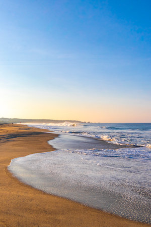 Extremely huge big surfer waves on the beach at La Punta de Zicatela Puerto Escondido Oaxaca Mexico.の写真素材