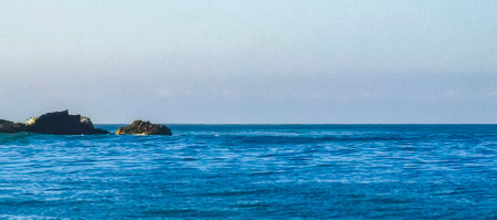 Extremely huge big surfer waves on the beach at La Punta de Zicatela Puerto Escondido Oaxaca Mexico.の写真素材