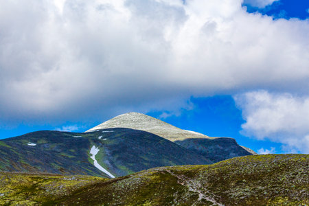 Beautiful mountain and landscape panorama with untouched nature hills and rocks stones in Rondane...