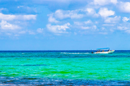Boat yacht ship ferry jetty pier and harbor at the tropical mexican beach panorama view from Playa 88 and Punta Esmeralda in Playa del Carmen Quintana Roo Mexico.の写真素材