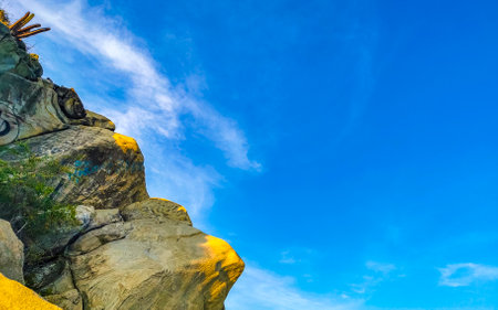 Mountains mountain panorama cliffs hills rocks and hilly tropical landscape in Puerto Escondido Oaxaca Mexico.の写真素材
