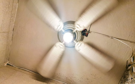 White fan rotates under roof in Playa del Carmen Quintana Roo Mexico.の写真素材