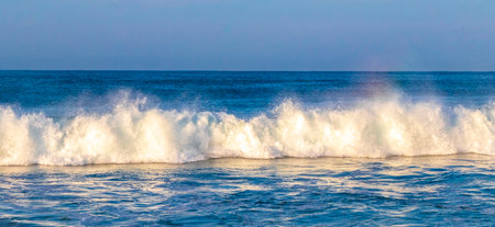 Extremely huge big powerful surfer waves on the beach in Zicatela Puerto Escondido Oaxaca Mexico.