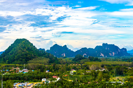 Nature mountains tropical jungle forest limestone cliffs panorama and the village town city Ao Nang Amphoe Mueang Krabi Thailand in Southeast Asia.の写真素材