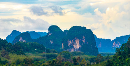 Nature mountains tropical jungle forest limestone cliffs panorama and the village town city Ao Nang...