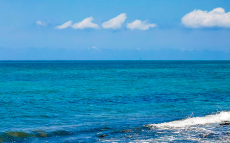 Tropical mexican caribbean beach landscape panorama with clear turquoise blue water in Playa del Carmen Mexico.の写真素材