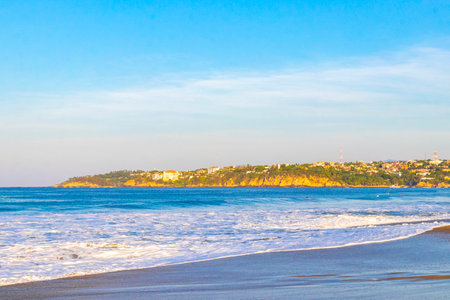 Extremely huge big powerful surfer waves on the beach in Zicatela Puerto Escondido Oaxaca Mexico.