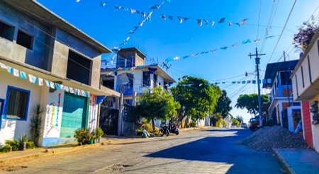 Puerto Escondido Oaxaca Mexico March 25, 2023 Typical beautiful colorful tourist street road and...