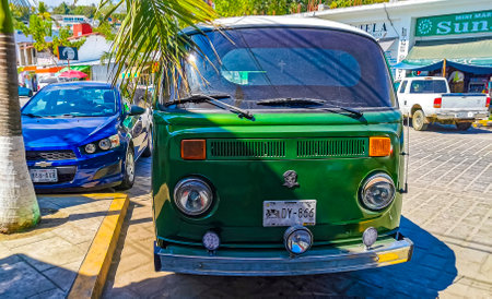 Puerto Escondido Oaxaca Mexico February 06, 2023 Various old vintage classic minibuses vans transporters vehicles cars in Puerto Escondido Zicatela Oaxaca Mexico.のeditorial素材
