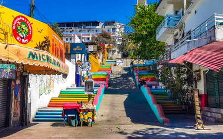 Puerto Escondido Oaxaca Mexico March 24, 2023 Colorful stairs and steps in rainbow colors in Zicatela Mexico.のeditorial素材